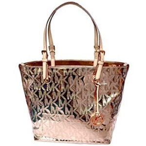Rose gold Michael Kors tote, excellent con…